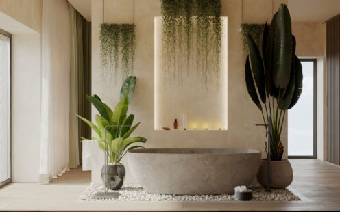 "central point of the bright spacious home spa area is this stone made bathtube , ideal place for relaxation "